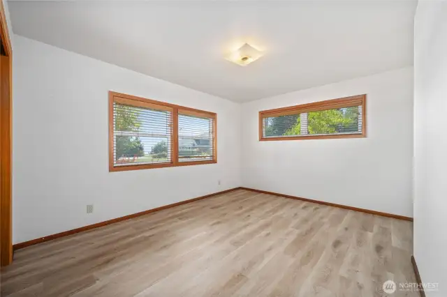 Bedroom #1 has bay view & laminate flooring