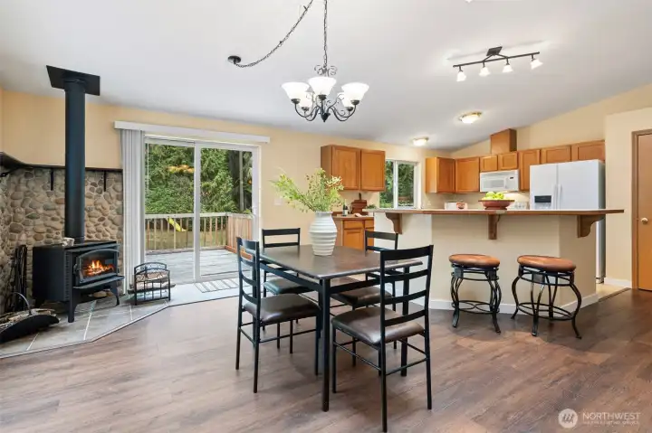 Wonderful open kitchen concept with wood burning fireplace.