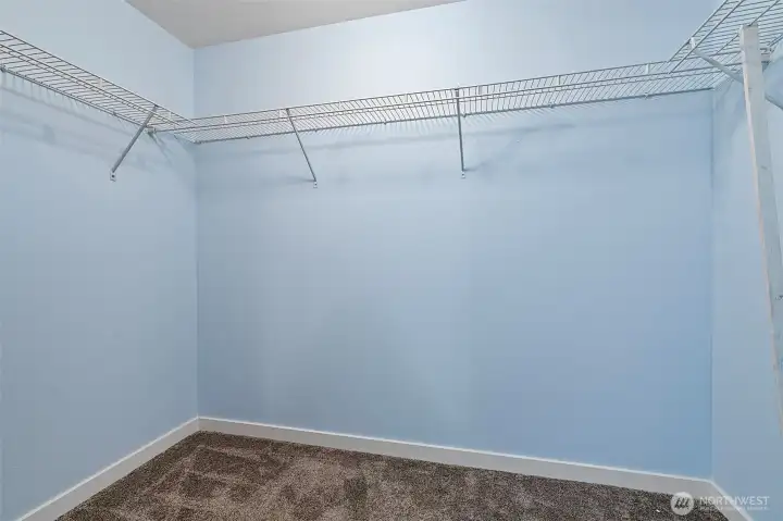 Walk in closet with hidden crawl space for lots of extra storage.