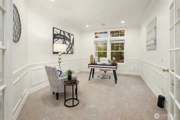 French doors lead to the main floor den.