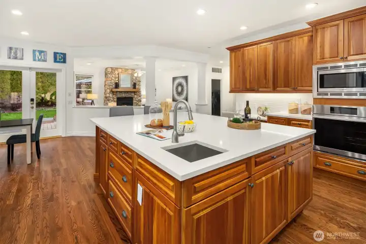 Better than new refinished real cherry wood cabinets, new quartz counters.