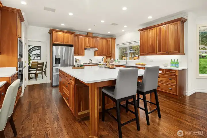 Kitchen opens to the formal dining room and features a pantry.