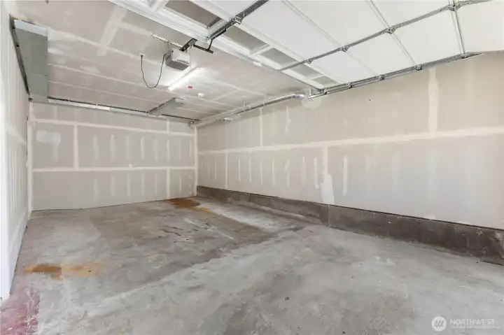 Large garage with opener.