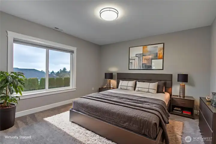 Virtually Staged photo of 3rd bedroom downstairs.