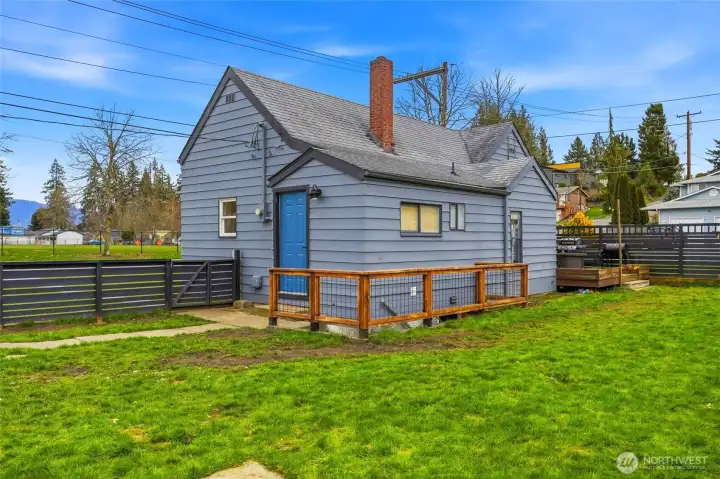 Backdoor of the home with the access to the basement