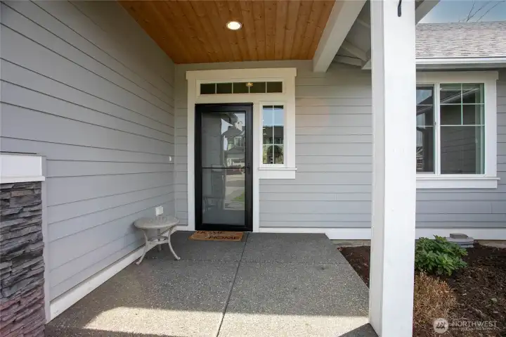 Enjoy the charm and functionality of the covered front vestibule—a welcoming touch for guests and protection from the elements.