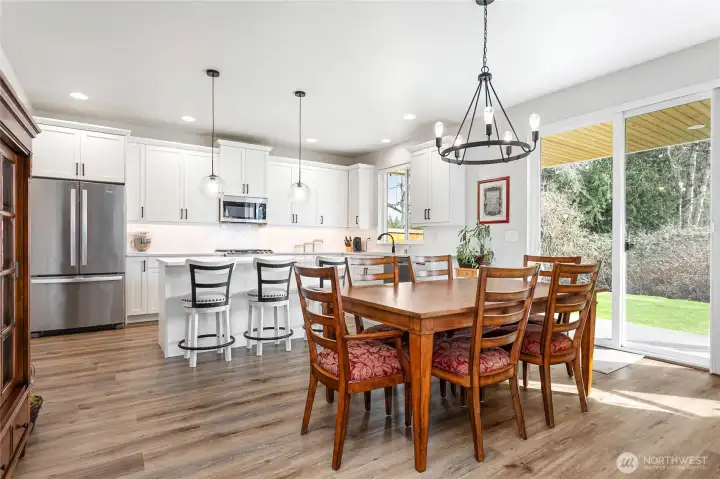 The dining area off the kitchen offers plenty of space and can easily be extended—perfect for hosting family gatherings, holiday dinners, or even Thanksgiving at your home!