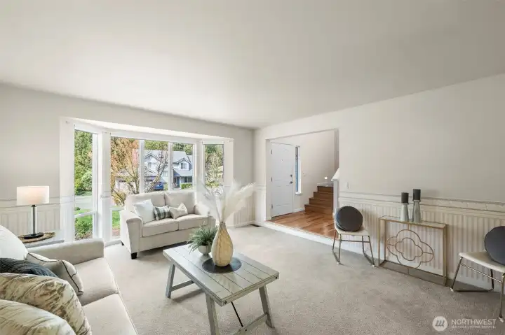 Formal living room with large picture windows.