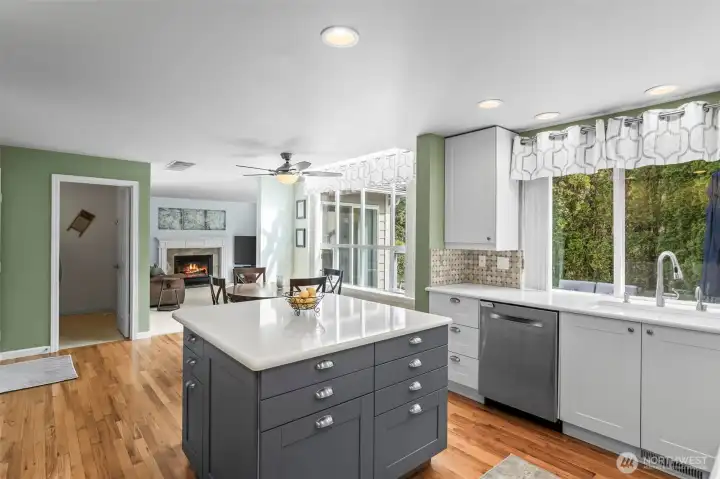 Seamless flow from kitchen to casual dining area.