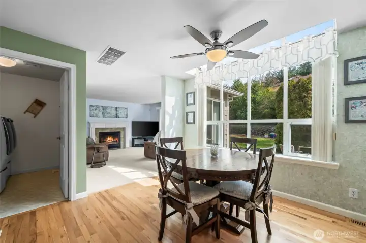 Casual dining room looks out to the backyard.