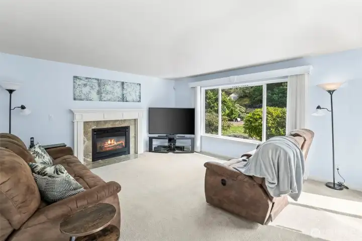 Casual living room/family room with slider to backyard.