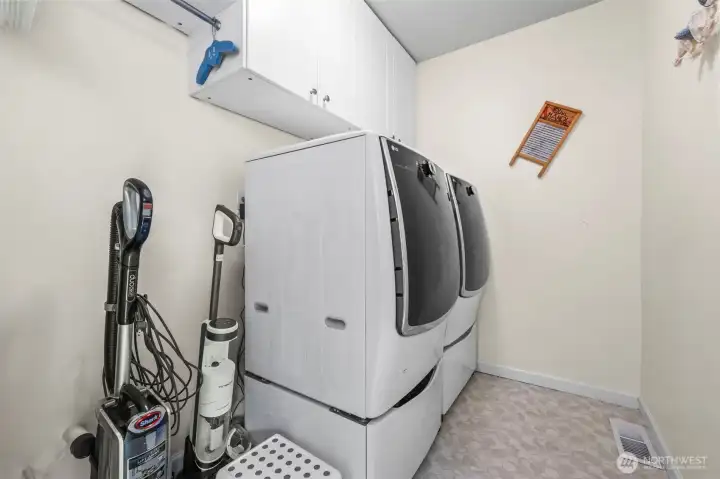Laundry room just off casual dining room.