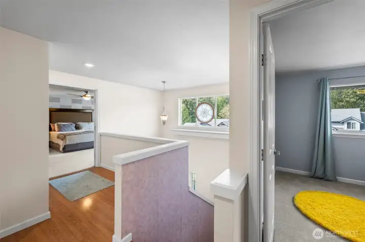 A nice separation between primary and other bedrooms!