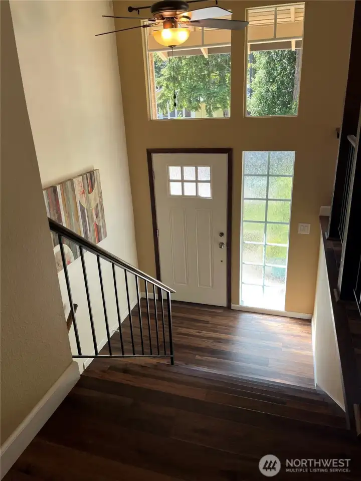 Newer LPV flooring on stairs and main living area.  Stairs are nice and wide and open to living space upstairs.