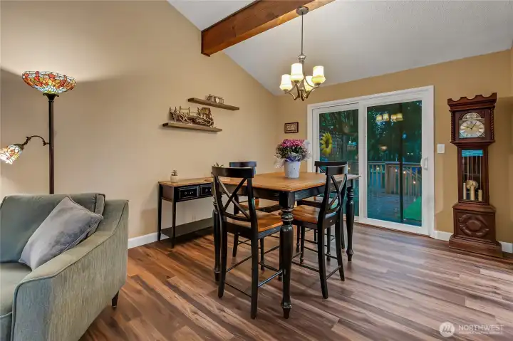 Dining room off kitchen, but still open to living space for entertaining.  Slider to back deck.