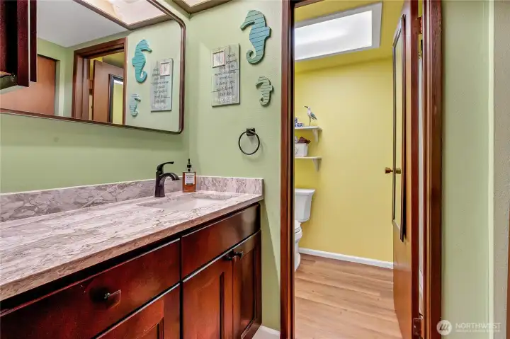 Primary bath recently updated with walk in shower.