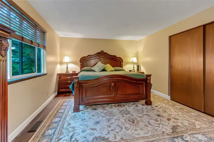 Primary with two closets and plenty of room.  Located off the back side of the house.