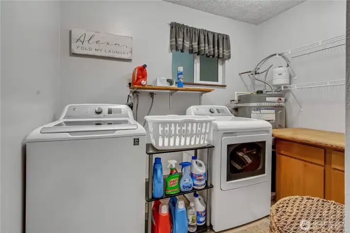 Downstairs laundry room.  Washer and Dryer stay!