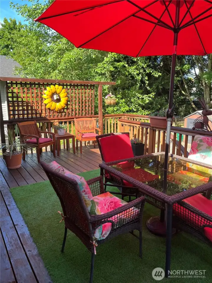 Backyard deck perfect for relaxing or entertaining.