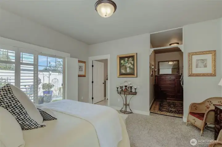 Primary bedroom with walk-in closet