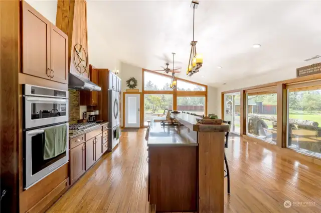 Ample space for big meal PREPARATION! Enjoy looking out to the wilderness and water while living your best life making serving amazing meals in this kitchen; possibly oysters, salmon, clam, crab, foul or any of the other natural food sources that surround this property. Perhaps bounties from your greenhouse garden too?