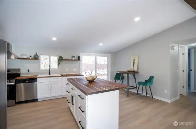 With ample workspace and extra drawers for storage, this kitchen island has everything you need to prepare and enjoy your meals. Beautiful, new butcher block counters are sure to please!