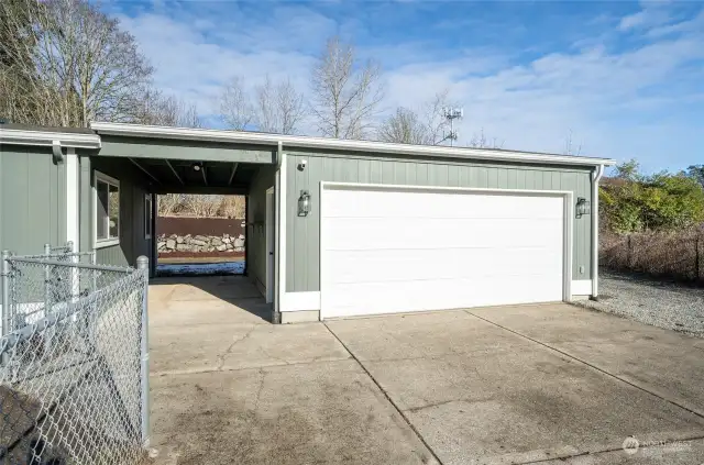 Detached 2 garage with covered breezeway from the home. Store your cars, ATV's, motorcycles and more!