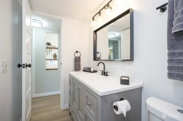 A different angle showcasing the spacious and well-appointed full guest bathroom.