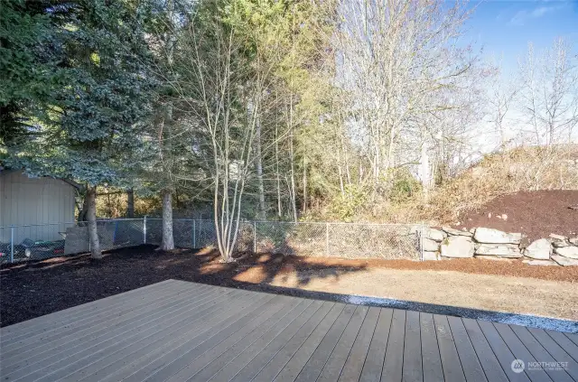 Enjoy a private backyard with a brand-new deck, perfect for entertaining and unwinding.