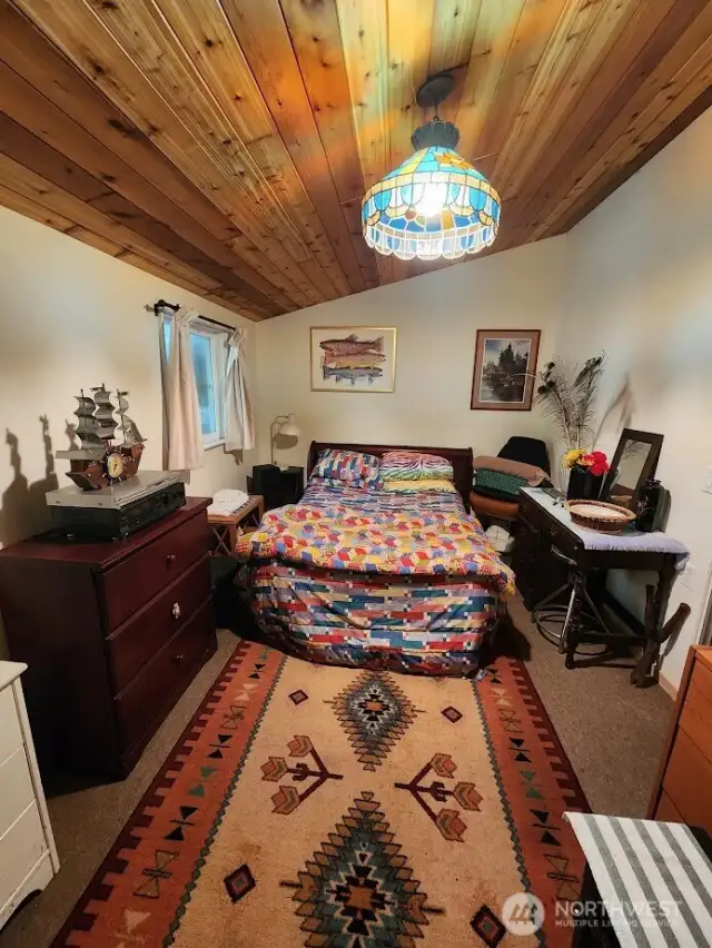 Large add-on bedroom with sliding door.