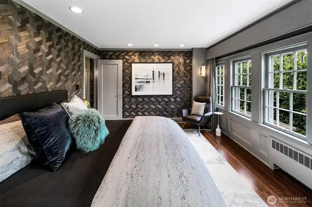 In the Owner’s Suite Bedroom, pattern and poise converge. Velvet, silk, and graphic wallpaper create a tactile retreat overlooking the gardens, while sunlight glances off layers of neutral tone and high-contrast drama. This is rest, redefined.