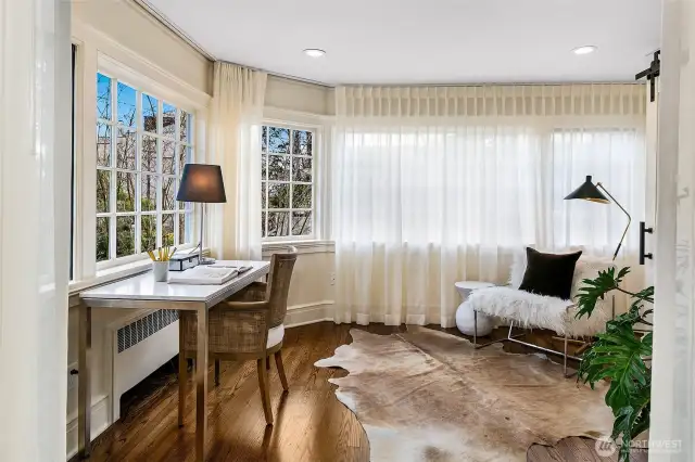 The adjoining Suite 2 Study offers a peaceful perch wrapped in windows and warmed by sunlight. Ideal for writing, remote work, or afternoon repose, it echoes the home’s layered approach to comfort—where every room carries both intention and grace.
