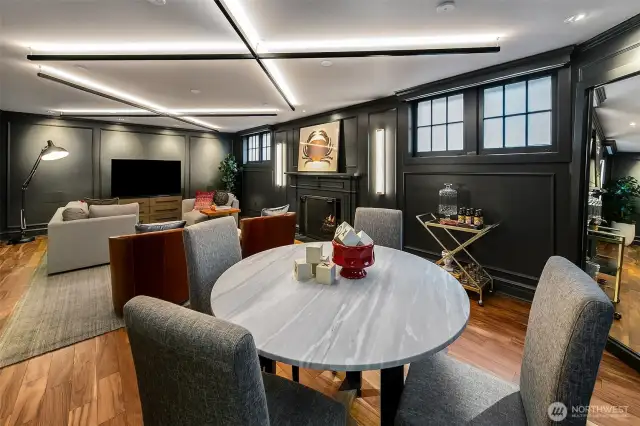 On Level 1, the Media/Theater/Family room merges moody sophistication with warm hospitality. Dark millwork, inset lighting, and flexible zones for games, screening, or conversation make this a social sanctuary—refined yet relaxed, just like the rest of the home.