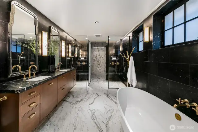 Winner of the 2023 Luxe Interiors + Design Excellence Award, the En Suite Bath on Level 1 envelops you in Nero Marquina marble, veined stone, and glints of brass. A freestanding soaking tub, double vanity, and expansive glass shower offer a spa experience that rivals five-star hotels—right at home.