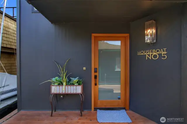Welcome home to a covered porch a deck space for your Amazon deliveries or just kick off your shoes.