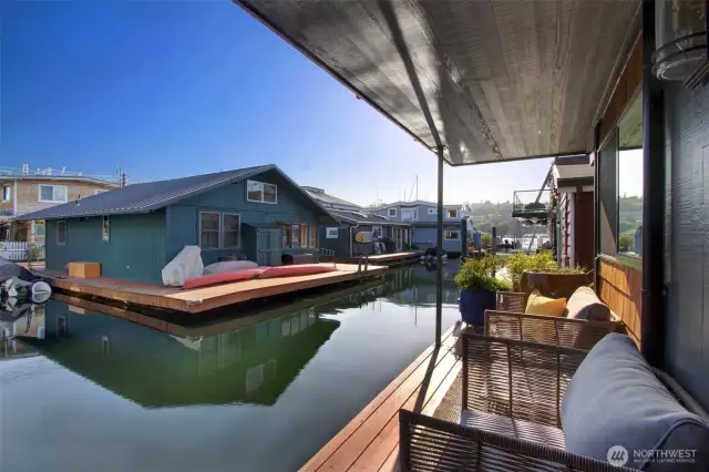 Dreamy summer days on one of three south facing decks.  We love that this one is covered and right outside the bedrooms.