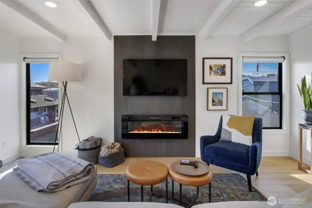 Hello fireplace with a flat screen conveniently mounted for your viewing pleasure.
