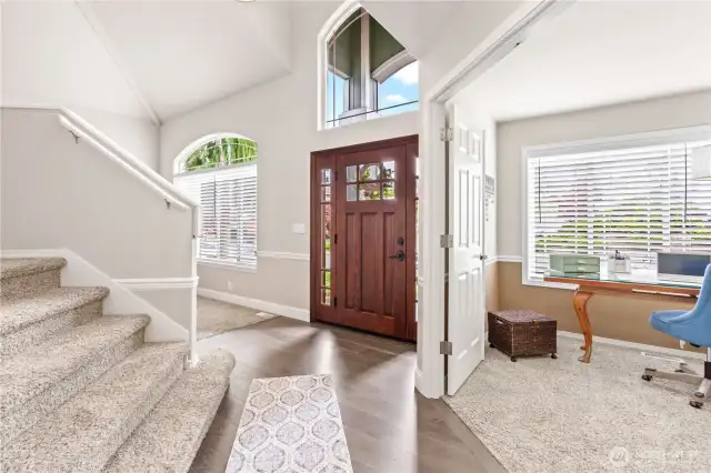 A look to the den and the stairs leading to the second floor