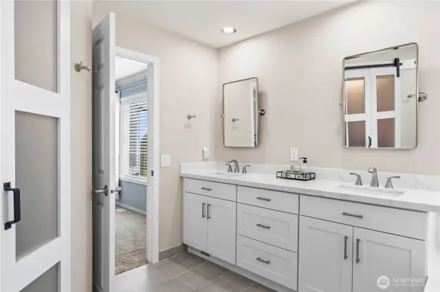 Lovely remodeled bath with dual sinks