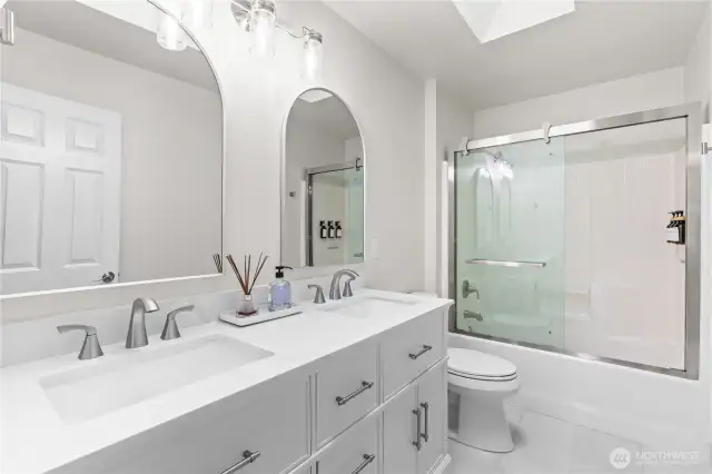 Fully renovated main hall bath with dual sinks...perfect for sharing