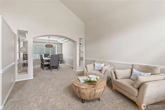 Living room flows to the formal dining room