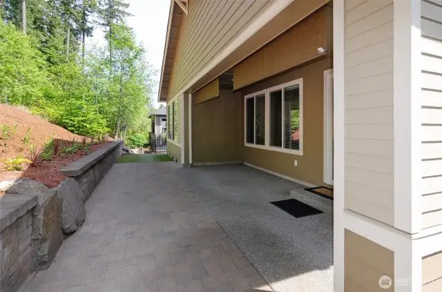 Extended patio offers room for gatherings and low maintenance living.