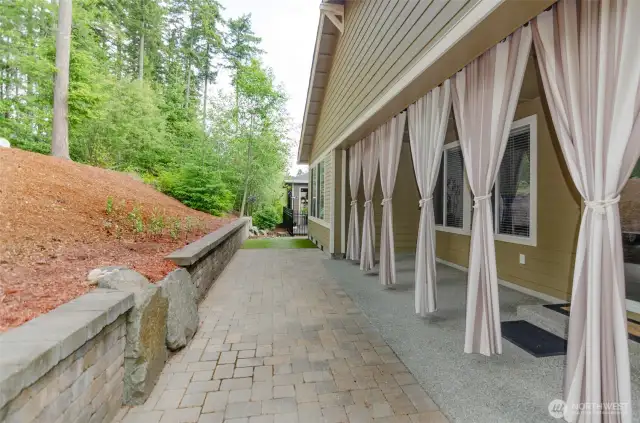 Extended patio offers room for gathering.