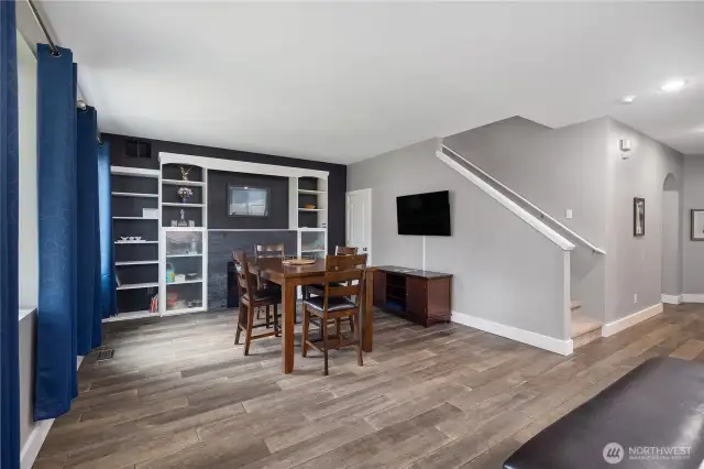 Cozy gas fireplace and built-ins.