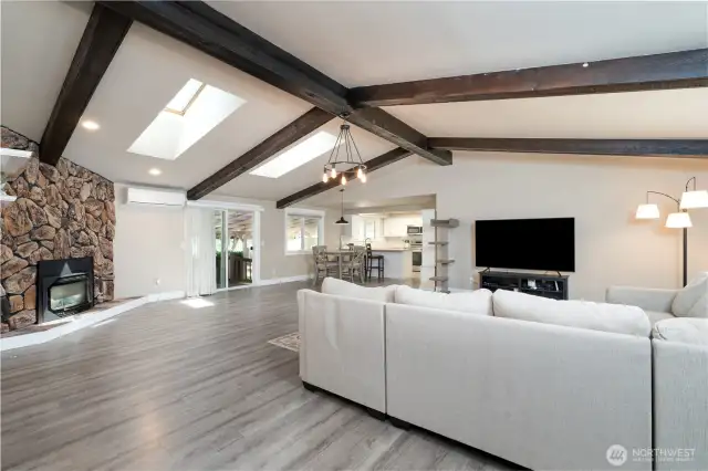 Skylights & Vaulted ceilings with gorgeous exposed beams in Main Living Area