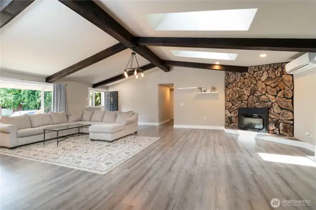 Skylights & Vaulted ceilings with gorgeous exposed beams in Main Living Area
