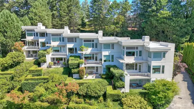 Privately nestled into a lush Mercer Island hillside.