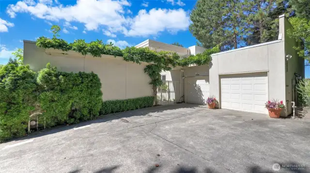 Plenty of parking outside and oversized two-car garage connected to the home with plenty of storage area.