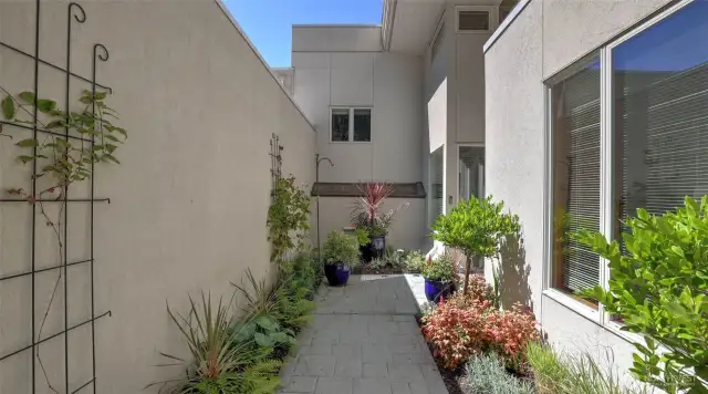 Outdoor spaces with a private garden patio.