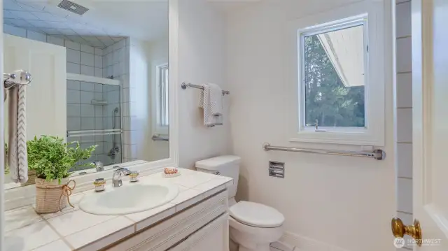 Second upstairs bedroom with its own full ensuite bath.